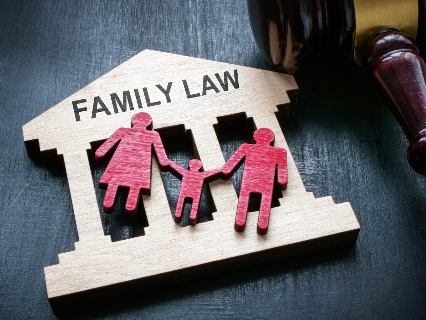 A wooden family law sign with the words " family law ".